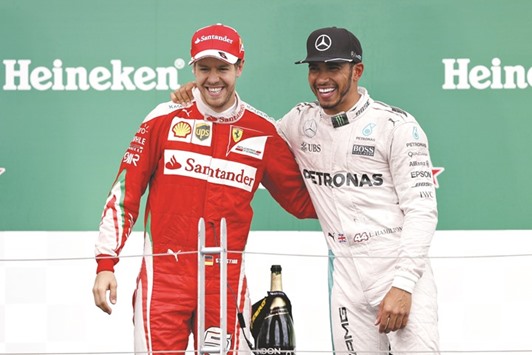 Sebastian Vettel (left)