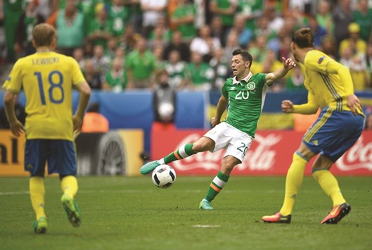 Irelandu2019s midfielder Wesley Hoolahan (centre) shoots to score a goal during the Euro 2016 Group E match against Sweden in Saint-Denis, France, yesterday. (AFP)