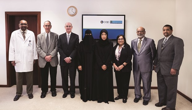 Inspectors from CAP with HE Dr Hanan Mohamed al-Kuwari, Minister of Public Health and other HMC officials.