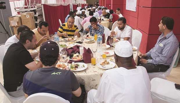 Workers attend the Rota Iftar.