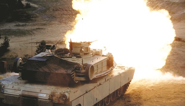 A US M1 Abrams tank fires during the u201cSaber Strikeu201d Nato military exercise in Adazi, Latvia.