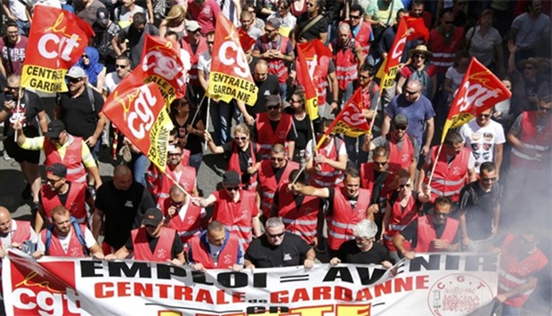 French labour union employees march during a demonstration