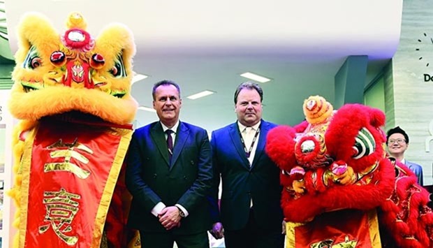 Ogiermann (left) and Qatar Airways Cargo senior vice president (sales and network planning) Peter Penseel at the official opening of the Qatar Airways Cargo stand at Air Cargo China where a traditional lion dance was performed to mark the occasion.