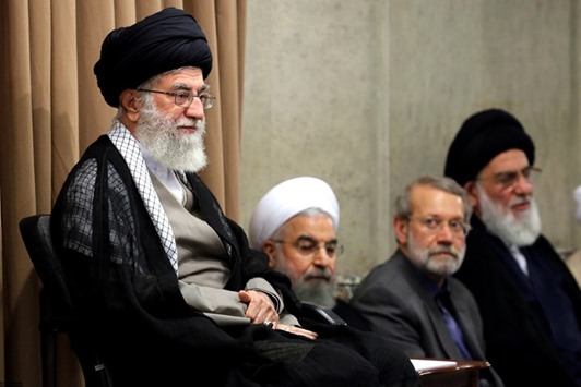 Iranu2019s supreme leader Ayatollah Ali Khamenei with President Hasan Rouhani, Parliament Speaker Ali Larijani, and former judiciary chief Mahmoud Hashemi Shahroudi attending a meeting with Iranian senior officials in Tehran.