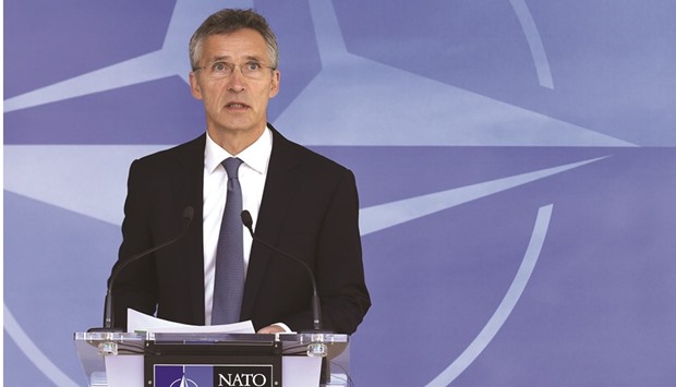 Nato Secretary-General Jens Stoltenberg addresses the press ahead of the Nato Defense Council meeting in Brussels.