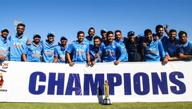 Indian players pose with the ODI series trophy after winning the third and final match against Zimbabwe at the Harare Sports Club on Wednesday.