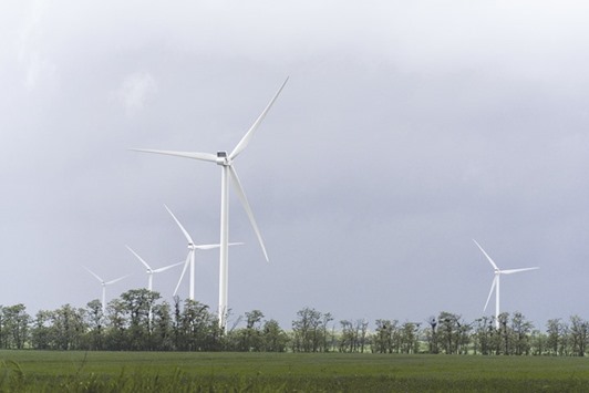 Wind turbines operated near a farmland at the Botievo wind farm in Botievo, Ukraine. The cost of renewables technology is set to keep falling into the next decade, boosting the economic case for clean energy, according to an industry group.