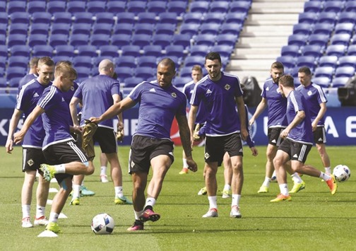 Northern Ireland players attend a training session at the Parc Olympique Lyonnais stadium in Lyon yesterday, on the eve of their Euro 2016 Group C match against Ukraine. (AFP)