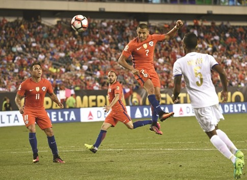 Chileu2019s Alexis Sanchez heads the ball to score against Panama during their Copa America Centenario match in Philadelphia on Tuesday. (AFP)