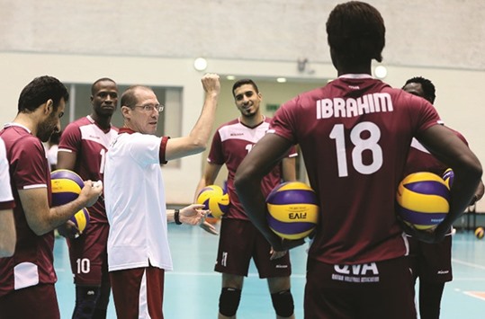 Qatar coach Roberto Piazza speaks to his players during a practice session ahead of their FIVB World League debut in Slovenian capital Ljubljana.