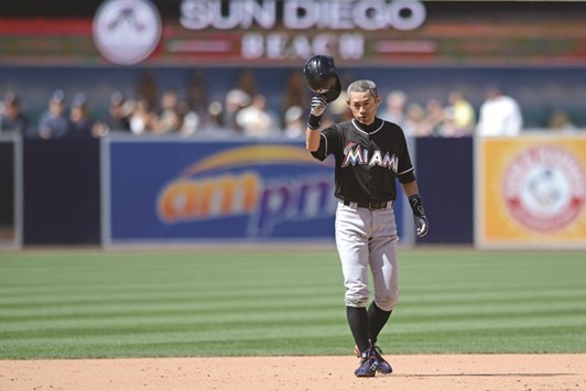 Miami Marlinsu2019s Ichiro Suzuki tips his helmet after hitting his 4,257th professional hit with a double against the San Diego Padres during the ninth inning. PICTURE: USA TODAY Sports