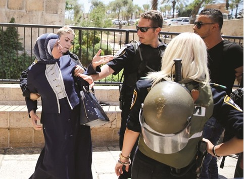 A Palestinian woman argues with Israeli police near Damascus Gate in Jerusalemu2019s Old City.