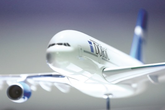 A model Airbus A380 is seen during a news conference at the Paris Air Show (file). Leasing firm Doric is in talks with a number of potential operators for a tranche of double-deckers that could be returned by Singapore Airlines and Emirates from 2017 following the completion of 10-year leases.