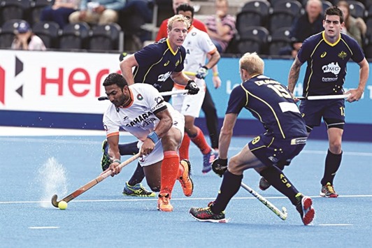 Indiau2019s Raghunath in action during Champions Trophy league match against Australia in London yesterday.