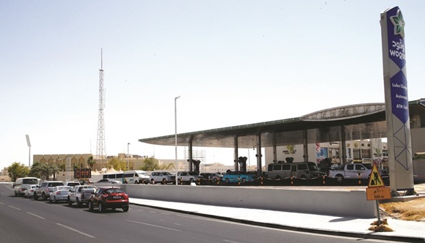 Traffic buildup remains heavy along Najma Street, especially in the afternoons. Motorists refuelling at the Woqod Al Hilal service station have yet to benefit from the extended fuel pump hoses installed in 19 other Woqod service stations in different parts of the country. PICTURE: Jayaram