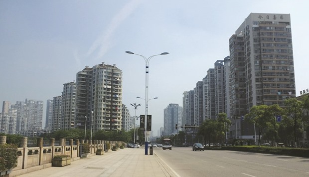 Residential buildings in Wenzhou, Zhejiang province. Average new home prices in 70 major Chinese cities climbed 6.9% last month from a year ago, accelerating from Aprilu2019s 6.2% rise, according to Reuters calculations based on data from the National Statistics Bureau yesterday.