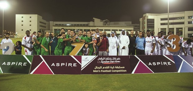 Munshat Abdullatif players celebrate after winning the Aspire Zone Foundation Ramadan Sports Festivalu2019s football title.