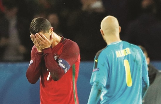 Cristiano Ronaldo reacts after missing a penalty.