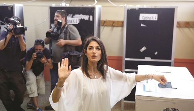 Virginia Raggi, 5-Star Movement candidate for Romeu2019s mayor, casts her vote at the polling station in Rome.