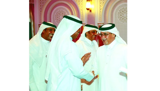 Qatar Football Association (QFA) vice president Saoud al-Mohannadi (right) at the QFA staff Suhoor.