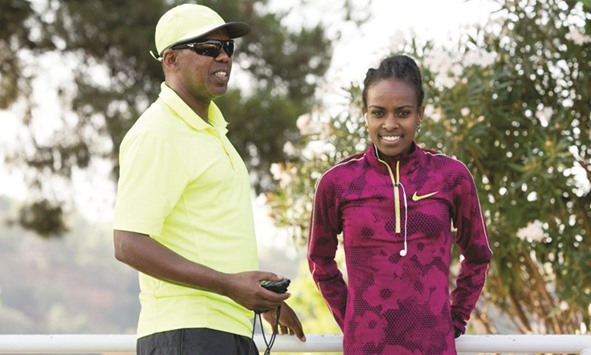 File picture of Jama Aden (left) and Genzebe Dibaba.