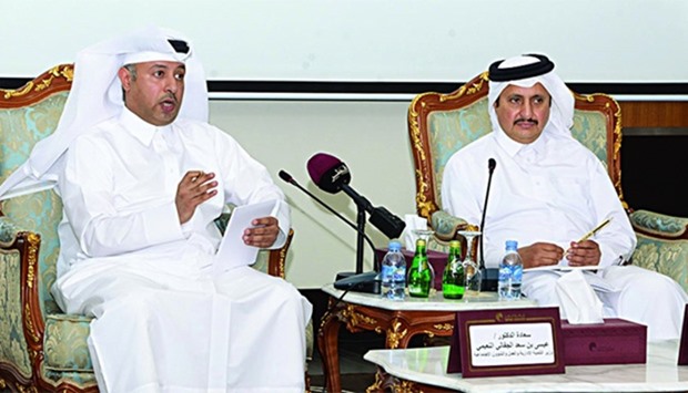 HE the Minister for Administrative Development and Labour and Social Affairs Dr Issa Saad al-Juffali al-Nuaimi (left) gestures while Qatar Chamber chairman Sheikh Khalifa bin Jassim al-Thani looks on during a consultative meeting with private sector companies