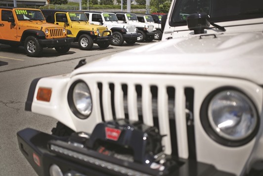 Jeep sales rose 14% from a year earlier, while minivan deliveries rose 84% to 22,213, Fiat Chrysler said.