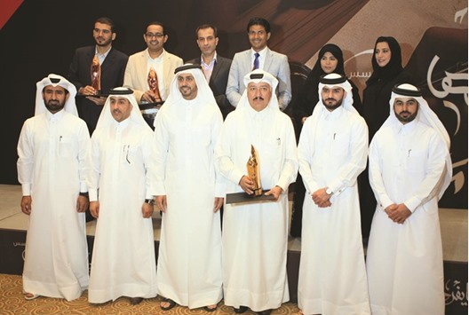 Winners with members of the Vodafone management.