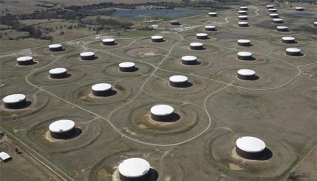 Crude oil storage tanks are seen at the Cushing oil hub, in Cushing, Oklahoma