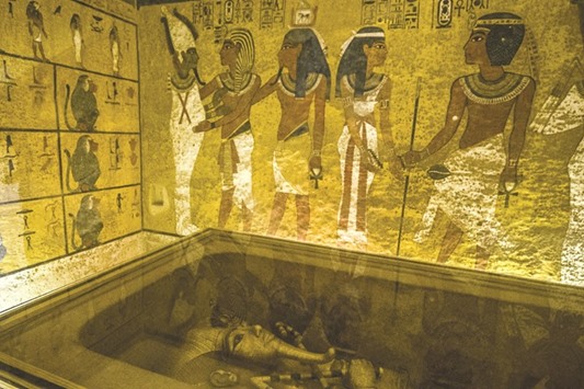 The golden sarcophagus of the ancient Egyptian Pharoah Tutankhamun displayed in his burial chamber in the Valley of the Kings, close to Luxor.