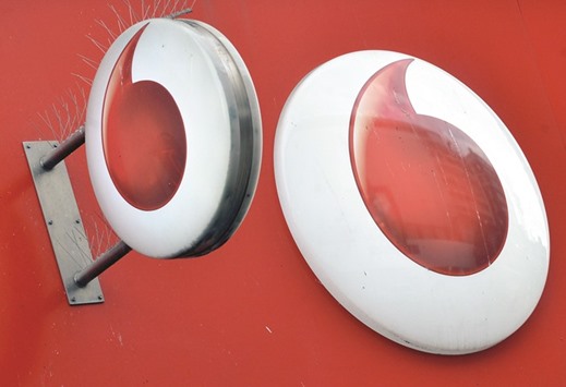 Vodafone branding is seen outside a retail store in London. The British telecoms groupu2019s India business had 198mn subscribers as of end-April, with about a 19.1% share of the total market, according to data from Telecom Regulatory Authority of India.