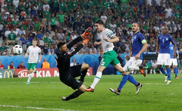 Republic of Irelandu2019s Robbie Brady scores during the Euro 2016 Group E match against Italy in Lille, France on Wednesday. Ireland won 1-0. (Reuters)