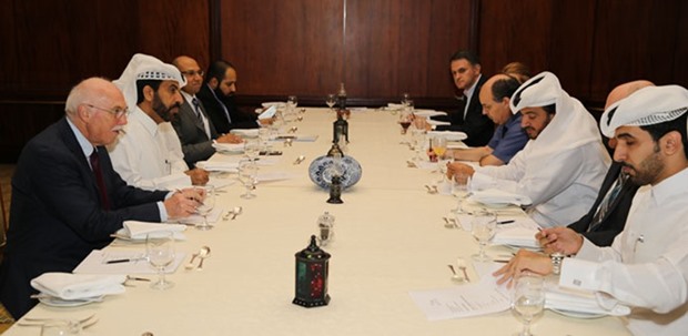 Al-Mansoori and other QSE officials with deans and professors of universities in Qatar exploring strategies to ensure the linkage between academia and finance industry.