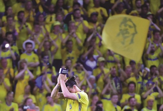 Swedenu2019s forward Zlatan Ibrahimovic acknowledges the spectators at the end of Euro 2016 Group E match against Belgium in Nice, France, on Wednesday. (AFP)