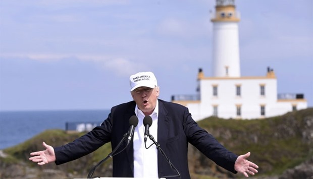 Republican presidential candidate Donald Trump speaks during a news conference, in front of the lighthouse, at his Turnberry golf course, in Turnberry, Scotland