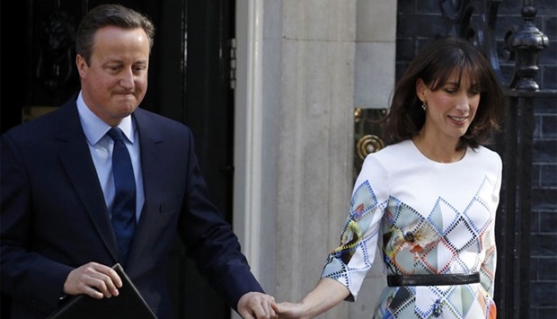 Britain\'s Prime Minister David Cameron leaves 10 Downing Street with his wife Samantha, to speak after Britain voted to leave the European Union, in London.