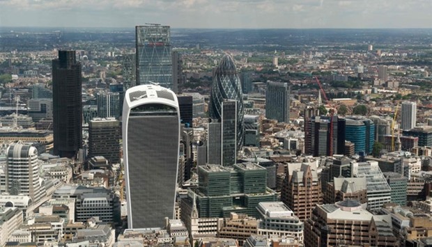 The City of London financial district including the Gherkin (R) and the 'Walkie Talkie' (C front) towers are seen in London on June 24, 2016 after the announcement that the UK had voted to leave the European Union in a national referendum.