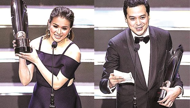 LJ Reyes and John Lloyd Cruz pose with their trophies during the Gawad Urian awards night. Reyes bagged the Best Actress award while Cruz won the Best Actor honour.