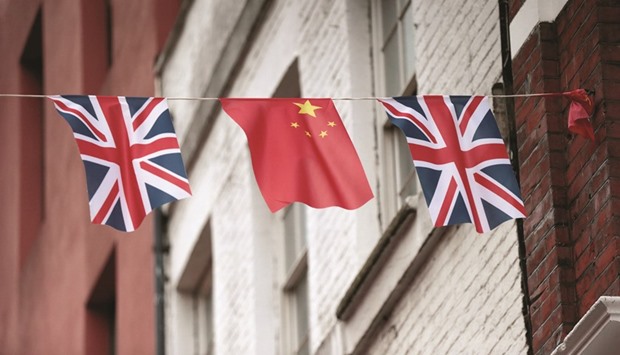 Chinese and British flags fly in Londonu2019s Chinatown. Fridayu2019s Brexit vote result threatens to redefine Britainu2019s growing financial services relationship with China, which has agreed to a number of joint projects as part of the China-UK Economic and Financial Dialogue (EFD) programme to deepen economic ties between the two counties, based largely on the UKu2019s membership of the EU.