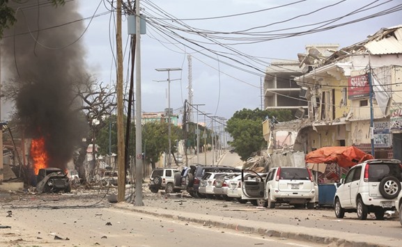 A general view shows the scene of a suicide bomb attack outside Nasahablood hotel in Mogadishu yesterday.