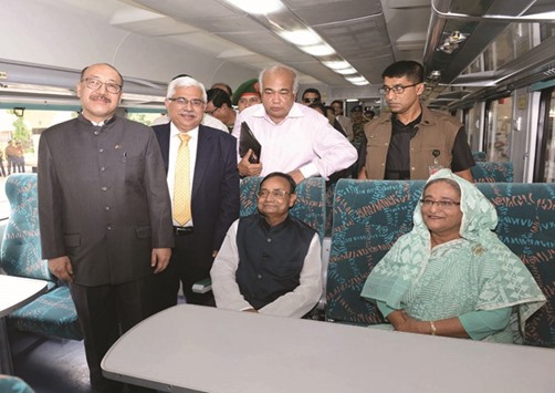 Prime Minister Sheikh Hasina, along with Railways Minister Mazibul Hoque and other officials, aboard the Sonar Bangla Express in Dhaka yesterday.