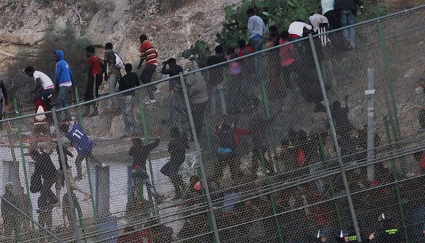 Melilla and Ceuta have for some years been a flashpoint for African migrants trying to enter Spain, with authorities stepping up security by strengthening border barriers.