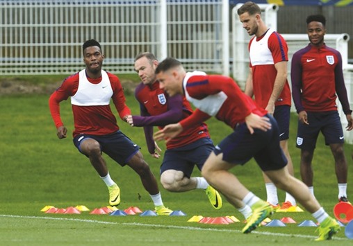 Englandu2019s Daniel Sturridge, Wayne Rooney, Ross Barkley, Jordan Henderson and Raheem Sterling during a training session yesterday. (Reuters)