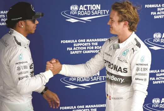 Mercedes drivers Lewis Hamilton (left) and Nico Rosberg