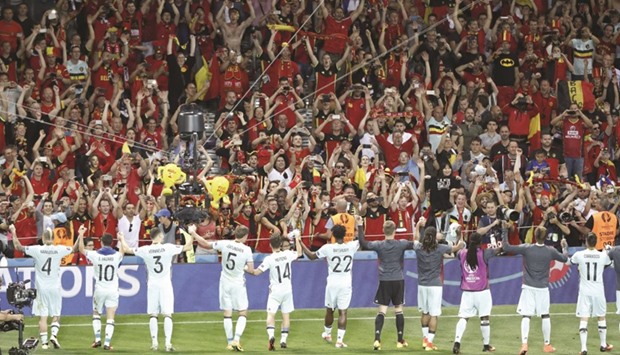 Belgium players celebrating with fans after the game yesterday.