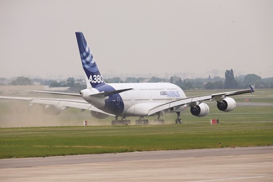 An Airbus A380 aircraft lands after performing a flying display on the opening day of the International Paris Air Show on June 15, 2015. As Western planemakers seek to finalise lucrative deals to sell some 200 jets to Iran, doubts are growing over the sale of a dozen Airbus A380 superjumbo jets to the countryu2019s national flag carrier, several people familiar with deal said.