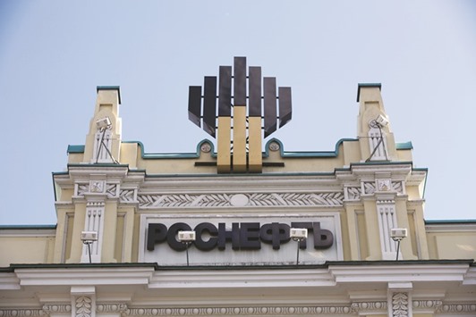 A logo is displayed above the headquarters of Rosneft in Moscow. The state-run crude producer is aiming to secure its hold in China by winning more clients and  establishing new delivery routes amid increasing competition and stretched infrastructure.