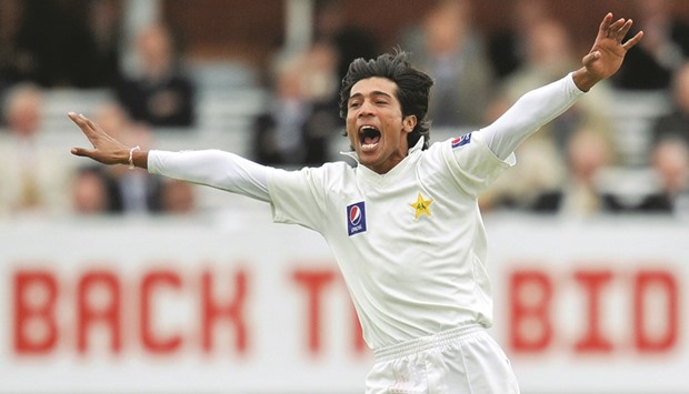File photo of Pakistanu2019s Mohamed Amir celebrating taking the wicket of Englandu2019s Matthew Prior (not pictured) on the second day of the fourth Test match between the two countries in 2010 at Lordu2019s Cricket Ground in London. Amir, 24, is expected to make his return to Test cricket next month against England at Lordu2019s, u2018the home of cricketu2019, where his exciting career came to a shuddering halt in 2010.