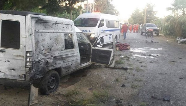 At least four suicide blasts hit the predominantly Christian village of Al-Qaa.