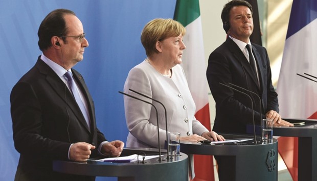 French President Francois Hollande, German Chancellor Angela Merkel and Italyu2019s Prime Minister Matteo Renzi addressing a press conference ahead of talks following the Brexit referendum at the chancellery in Berlin, yesterday.